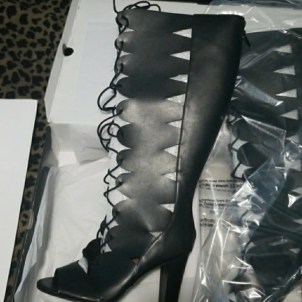 Women's 8.5 laced high heeled boots